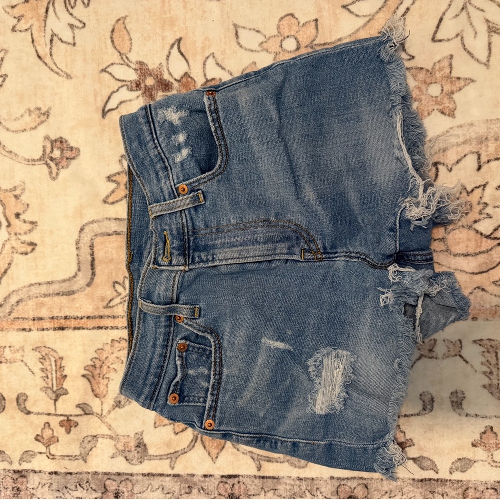 Levi's Medium Blue Distressed Denim Cutoff Shorts